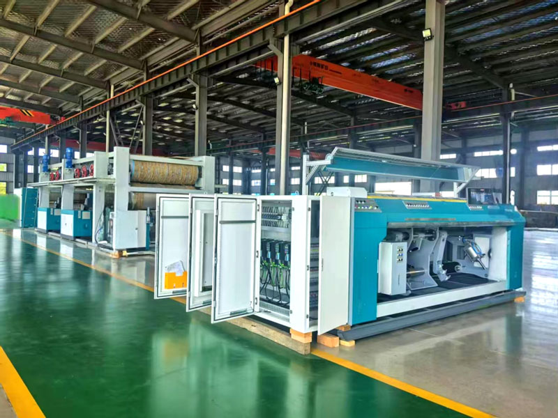 Air jet loom with jumbo roll